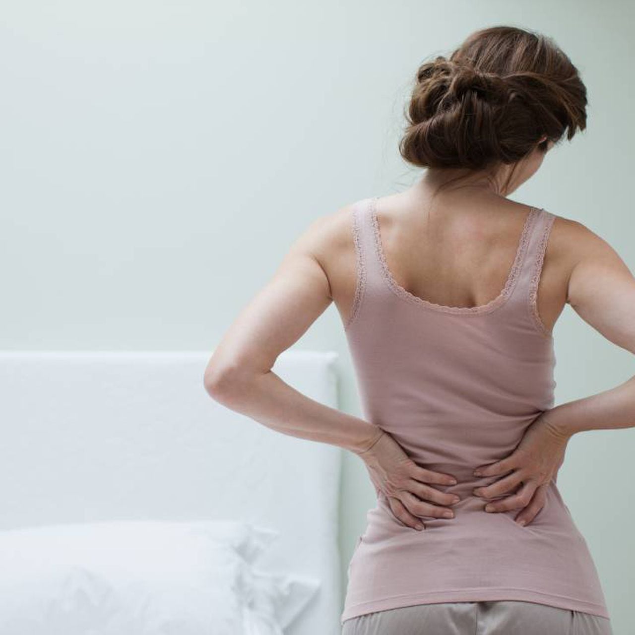 A qué se debe el dolor de espalda al toser?