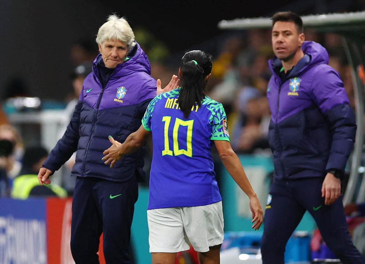 Soccer Football - FIFA Women’s World Cup Australia and New Zealand 2023 - Group F - Jamaica v Brazil - Melbourne Rectangular Stadium, Melbourne, Australia - August 2, 2023 Brazil's Marta with coach Pia Sundhage after being substituted REUTERS/Hannah Mckay