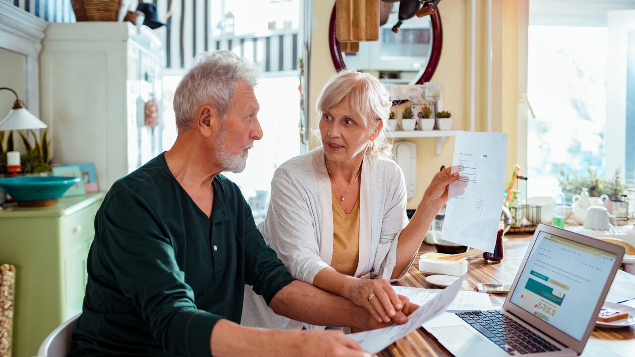 Close up of a senior couple doing home finances