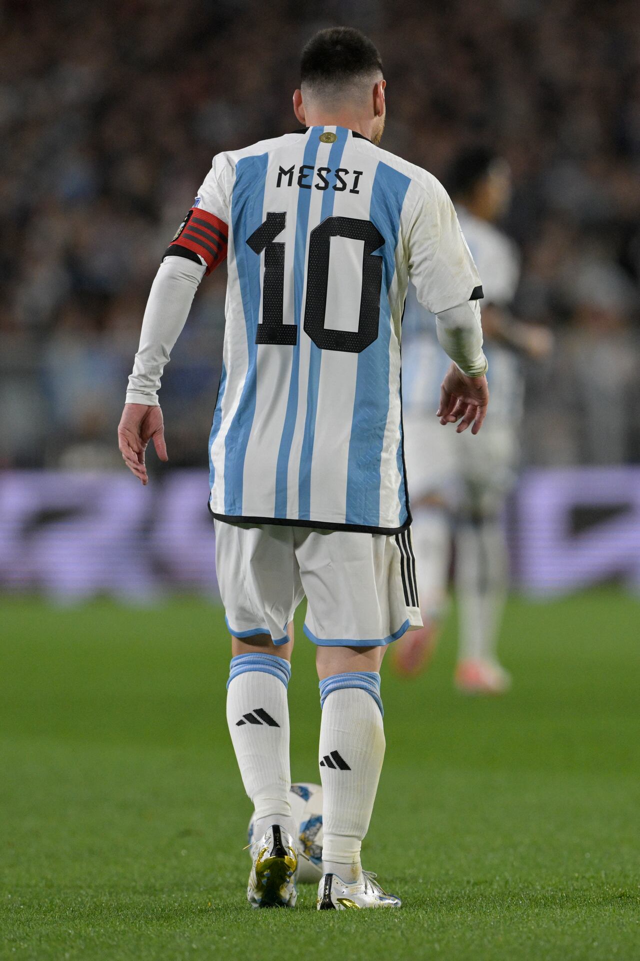 Argentina's forward Lionel Messi walks during the 2026 FIFA World Cup South American qualifiers football match between Argentina and Ecuador, at the Mas Monumental stadium in Buenos Aires, on September 7, 2023. (Photo by JUAN MABROMATA / AFP)