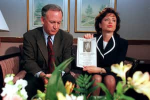 BOULDER, CO - MAY 01:  John and Patsy Ramsey, the parents of JonBenet Ramsey, meet with a small selected group of the local Colorado media after four months of silence  in Boulder, Colorado on May 1, 1997. Patsy holds up a reward sign for information leading to the arrest of their daughter's murderer.  Their 6-year-old daughter was found dead on Christmas night 1996. (Photo By Helen H. Richardson/ The Denver Post)