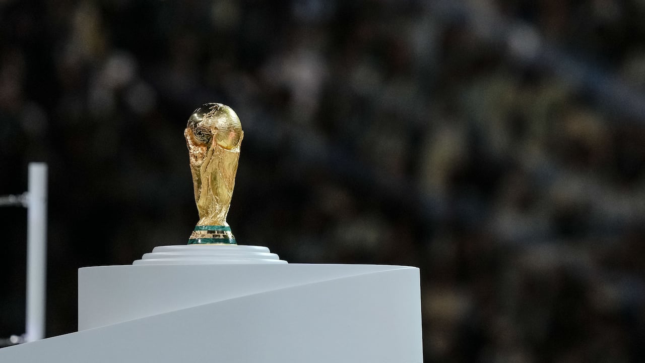 LUSAIL CITY, QATAR - DECEMBER 18: the World Cup trophy on its pedestal after the FIFA World Cup Qatar 2022 Final match between Argentina and France at Lusail Stadium on December 18, 2022 in Lusail City, Qatar. (Photo by Mohammad Karamali/Defodi Images via Getty Images)