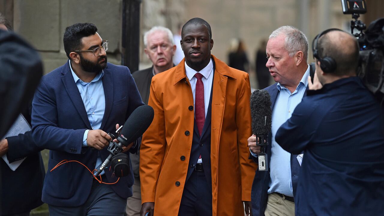 Former Manchester City footballer Benjamin Mendy, left, walks outside Chester Crown Court, where he is appearing accused of rape and attempted rape, in Chester, England, Friday July 14, 2023. (Peter Powell/PA via AP)
