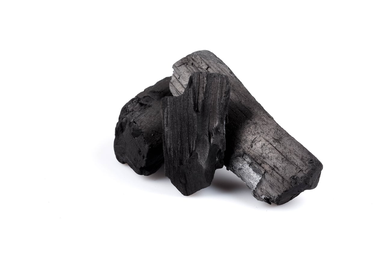 hardwood charcoal coal Isolated on white background