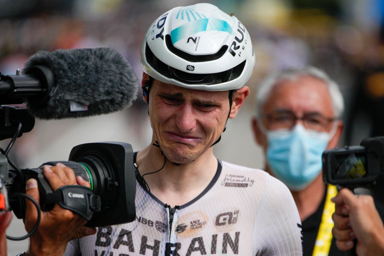 Stage winner Slovenia's Matej Mohoric cries after the nineteenth stage of the Tour de France cycling race over 173 kilometers (107.5 miles) with start in Moirans-en-Montagne and finish in Poligny, France, Friday, July 21, 2023. (AP Photo/Daniel Cole)