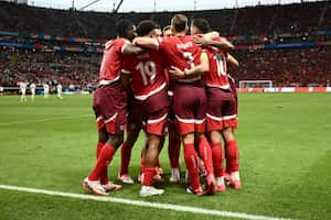 Switzerland's forward #19 Dan Ndoye celebrates scoring his team's first goal with his team mates during the UEFA Euro 2024 Group A football match between Switzerland and Germany at the Frankfurt Arena in Frankfurt am Main on June 23, 2024. (Photo by Angelos TZORTZINIS / AFP)