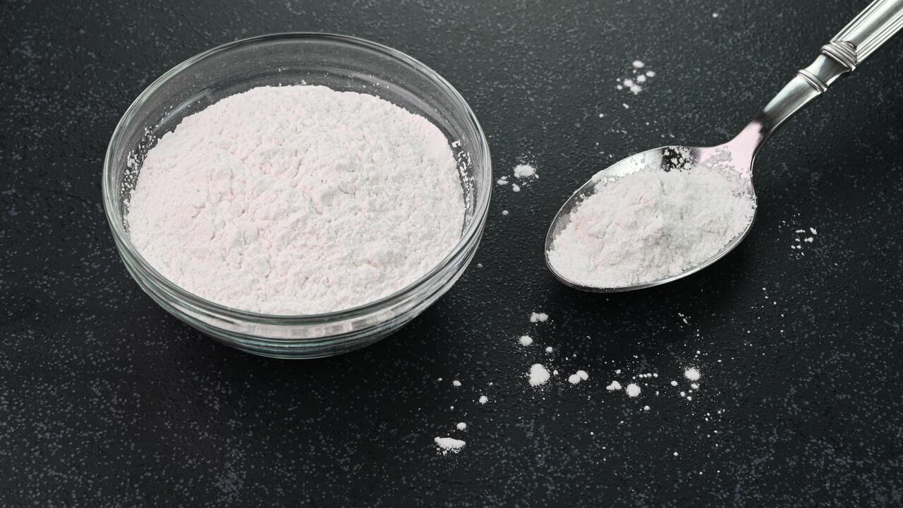 Closeup view of baking powder in a bowl.