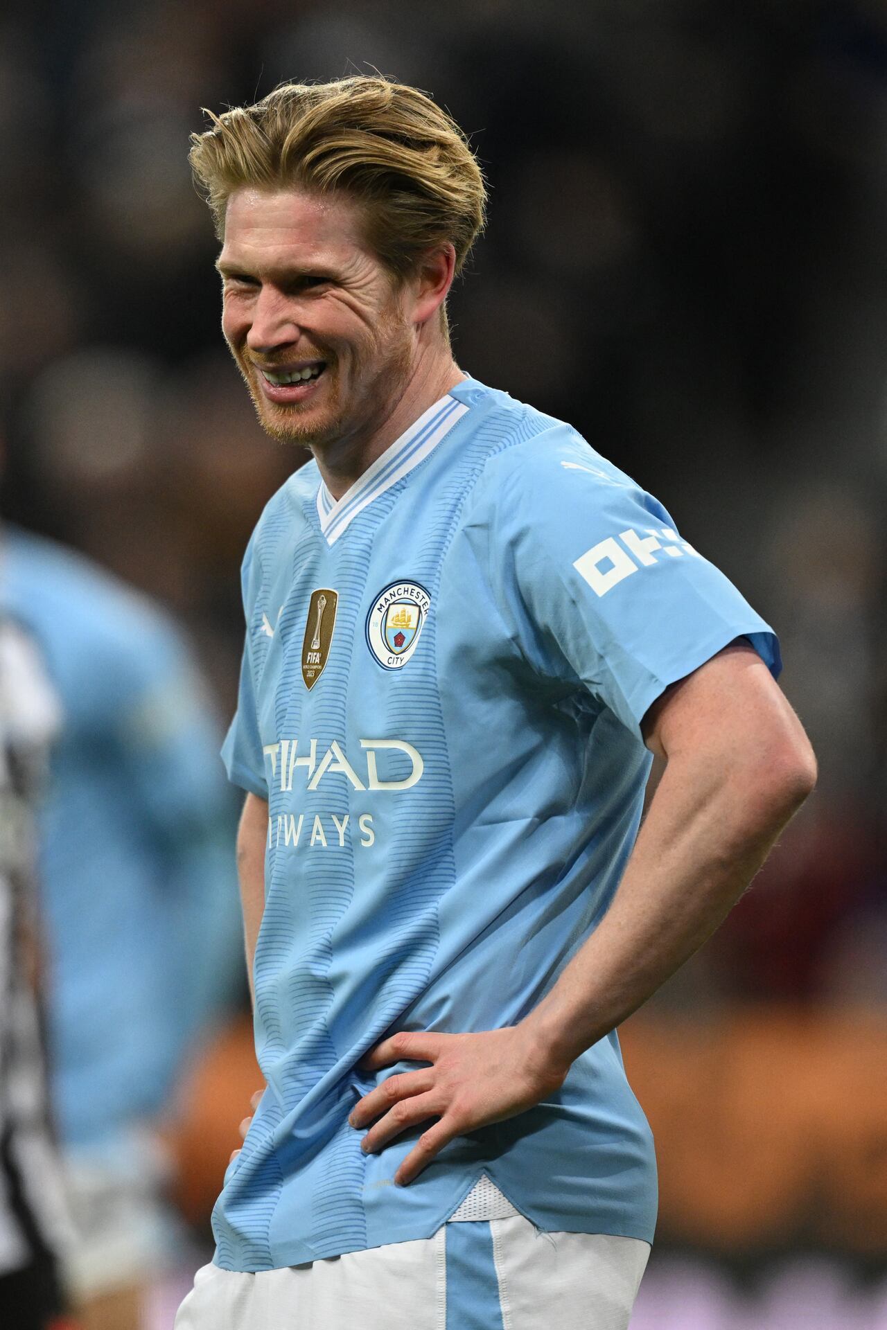 Manchester City's Belgian midfielder #17 Kevin De Bruyne smiles during the English Premier League football match between Newcastle United and Manchester City at St James' Park in Newcastle-upon-Tyne, north east England on January 13, 2024. (Photo by Oli SCARFF / AFP) / RESTRICTED TO EDITORIAL USE. No use with unauthorized audio, video, data, fixture lists, club/league logos or 'live' services. Online in-match use limited to 120 images. An additional 40 images may be used in extra time. No video emulation. Social media in-match use limited to 120 images. An additional 40 images may be used in extra time. No use in betting publications, games or single club/league/player publications. /