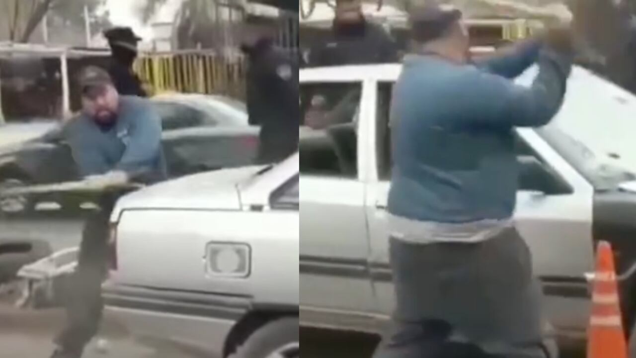 Hombre destruyendo su carro en Argentina