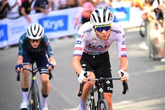 BOLOGNA, ITALY - JUNE 30: (L-R) Jonas Vingegaard Hansen of Denmark and Team Visma | Lease a Bike and Tadej Pogacar of Slovenia and UAE Team Emirates attack in the chase group during the 111th Tour de France 2024, Stage 2 a 199.2km stage from Cesenatico to Bologna / #UCIWT / on June 30, 2024 in Bologna, Italy. (Photo by Bernard Papon - Pool/Getty Images)
