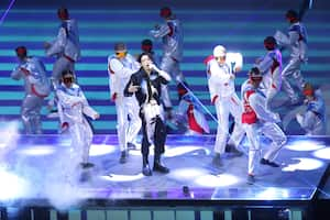 AL KHOR, QATAR - NOVEMBER 20: Jungkook of the South Korean Boy Band BTS performs during the opening ceremony prior to the FIFA World Cup Qatar 2022 Group A match between Qatar and Ecuador at Al Bayt Stadium on November 20, 2022 in Al Khor, Qatar. (Photo by Marc Atkins/Getty Images)