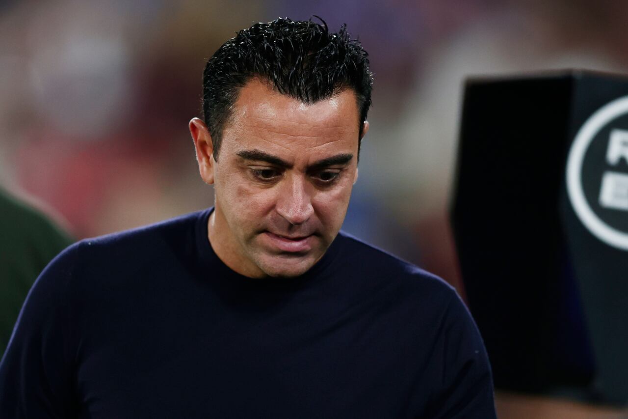 Barcelona's head coach Xavi Hernandez walks before the Spanish La Liga soccer match between Getafe and FC Barcelona at the Coliseum Alfonso Perez stadium in Getafe, Spain, Sunday, Aug. 13, 2023. (AP Photo/Alvaro Medranda)