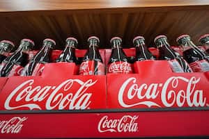 Bottles of Coca-Cola are on display at a grocery market in Uniontown, Pa, on Sunday, April 24, 2022. Coca-Cola reports earnings on Monday, April 24, 2023.  (AP Photo/Gene J. Puskar)