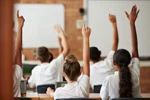 School students in class working with tablets