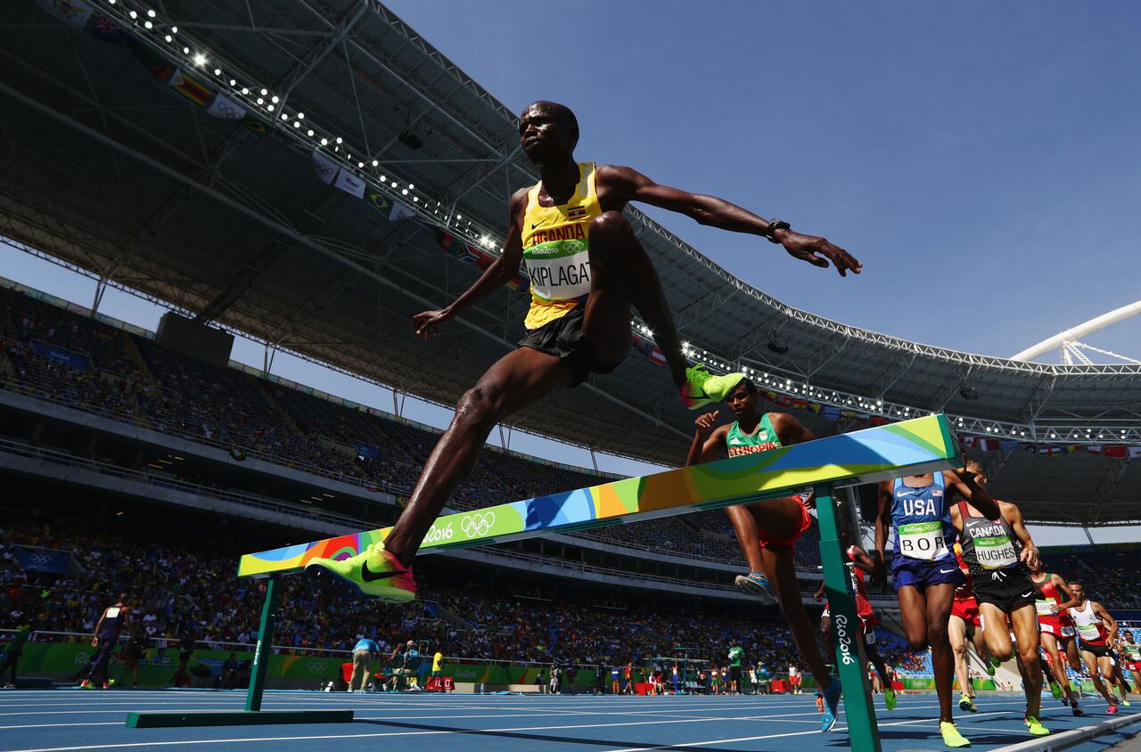 RIO DE JANEIRO, BRAZIL - AUGUST 15:  Benjamin Kiplagat of Uganda competes in round one of the Men's 3000m Steeplechase on Day 10 of the Rio 2016 Olympic Games at the Olympic Stadium on August 15, 2016 in Rio de Janeiro, Brazil.  (Photo by Paul Gilham/Getty Images)