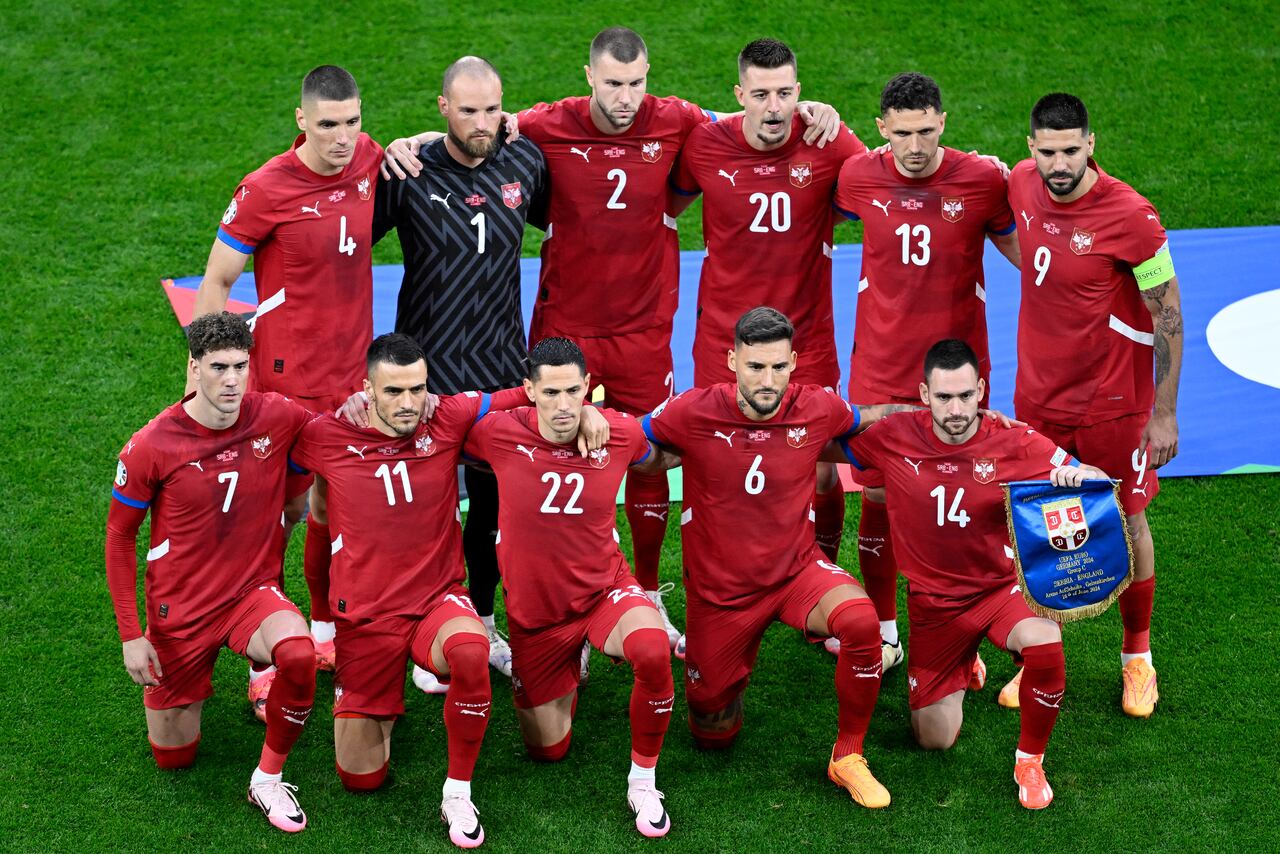 (Top L to R) Serbia's defender #04 Nikola Milenkovic, Serbia's goalkeeper #01 Predrag Rajkovic, Serbia's defender #02 Strahinja Pavlovic, Serbia's midfielder #20 Sergej Milinkovic-Savic, Serbia's defender #13 Milos Veljkovic, Serbia's forward #09 Aleksandar Mitrovic, (bottom L to R) Serbia's forward #07 Dusan Vlahovic, Serbia's forward #11 Filip Kostic, Serbia's midfielder #22 Sasa Lukic, Serbia's midfielder #06 Nemanja Gudelj and Serbia's forward #14 Andrija Zivkovic pose for a team picture during the UEFA Euro 2024 Group C football match between Serbia and England at the Arena AufSchalke in Gelsenkirchen on June 16, 2024. (Photo by INA FASSBENDER / AFP)