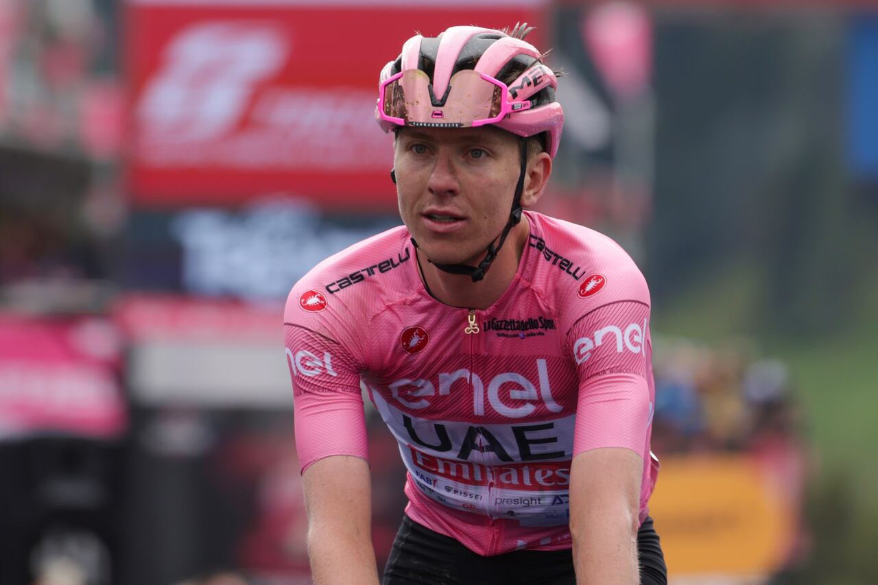 PASSO BROCON, ITALY - MAY 22: Tadej Pogacar of Slovenia and UAE Team Emirates - Pink Leader Jersey crosses the finish line as second place during the 107th Giro d'Italia 2024, Stage 17 a 159km stage from Selva di Val Gardena to Passo Brocon on May 22, 2024 in Passo Brocon, Italy. (Photo by Sara Cavallini/Getty Images)