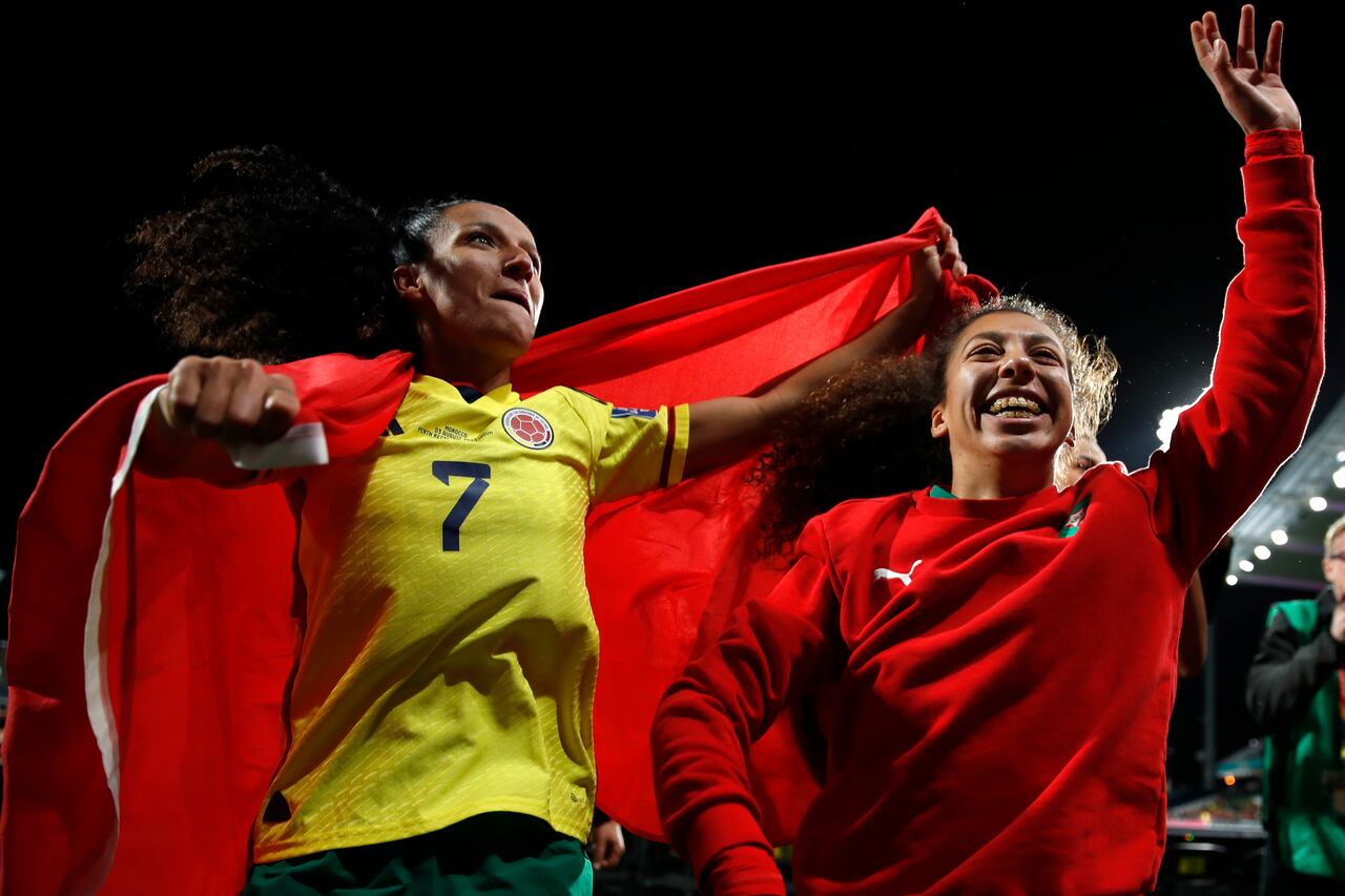 Morocco's Salma Amani, left, and Morocco's Fatima Gharbi celebrate after the Women's World Cup Group H soccer match between Morocco and Colombia in Perth, Australia, Thursday, Aug. 3, 2023. (AP Photo/Gary Day)