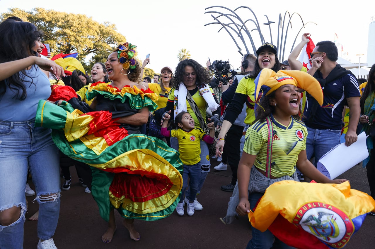 Colombia supporters cheer as they arrive to the venue before the start of the Australia and New Zealand 2023 Women's World Cup Group H football match between Morocco and Colombia at Perth Rectangular Stadium in Perth on August 3, 2023. (Photo by Colin MURTY / AFP)