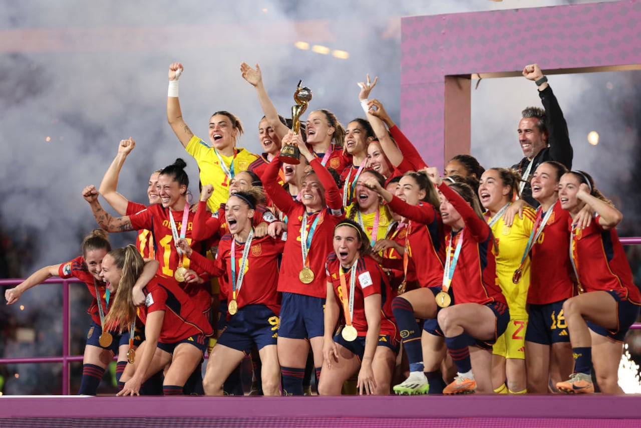 SYDNEY, AUSTRALIA - AUGUST 20: Ivana Andres of Spain lifts the FIFA Women's World Cup Trophy following victory in  the FIFA Women's World Cup Australia & New Zealand 2023 Final match between Spain and England at Stadium Australia on August 20, 2023 in Sydney, Australia. (Photo by Cameron Spencer/Getty Images)