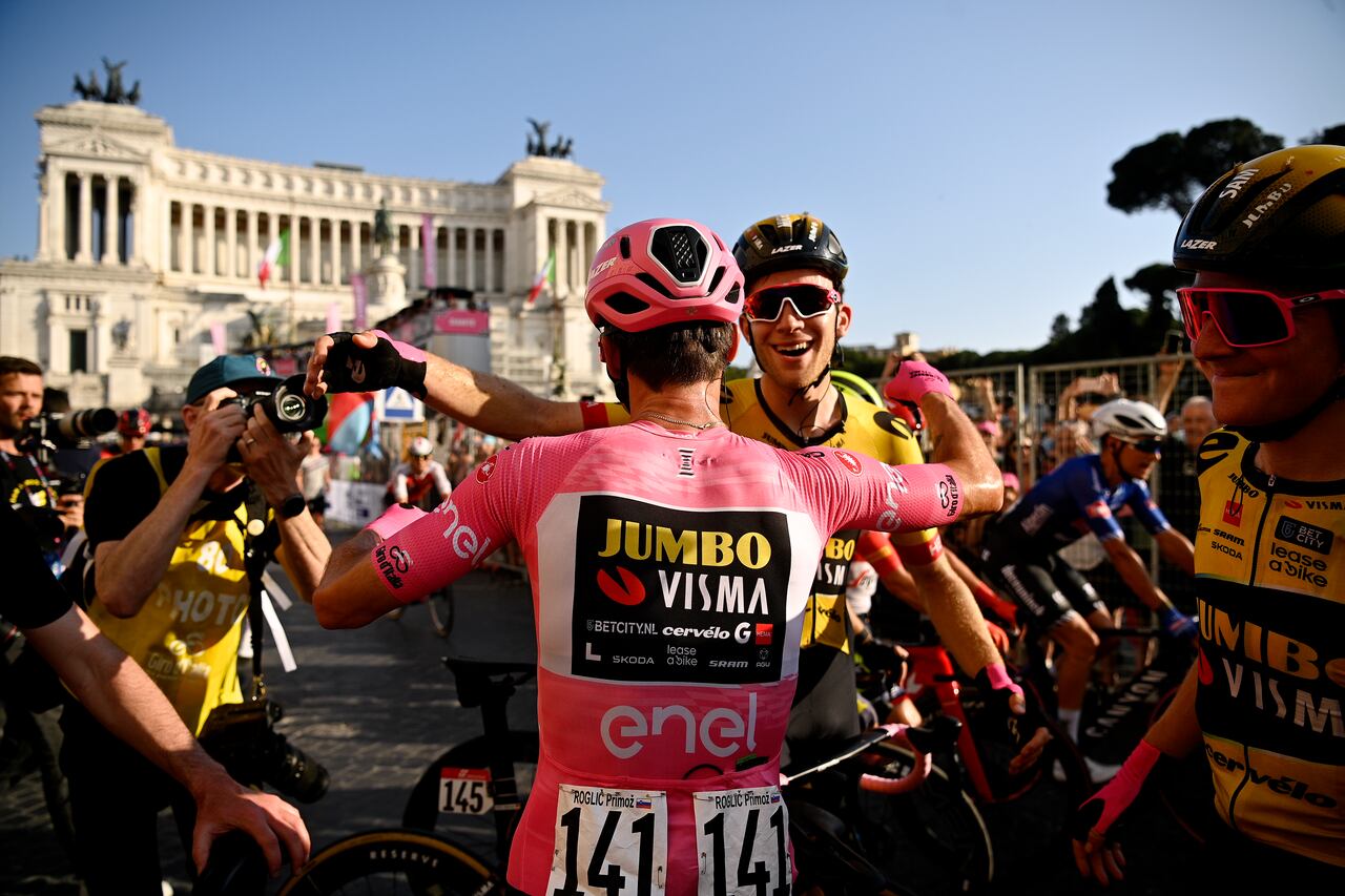 ROME, ITALY - MAY 28: (L-R) Race winner Primož Roglič of Slovenia - Pink Leader Jersey and Michel Hessmann of Germany and Team Jumbo-Visma react after the 106th Giro d'Italia 2023, Stage 21 a 126km stage from Rome to Rome / #UCIWT / on May 28, 2023 in Rome, Italy. (Photo by Fabio Ferrari - Pool/Getty Images)