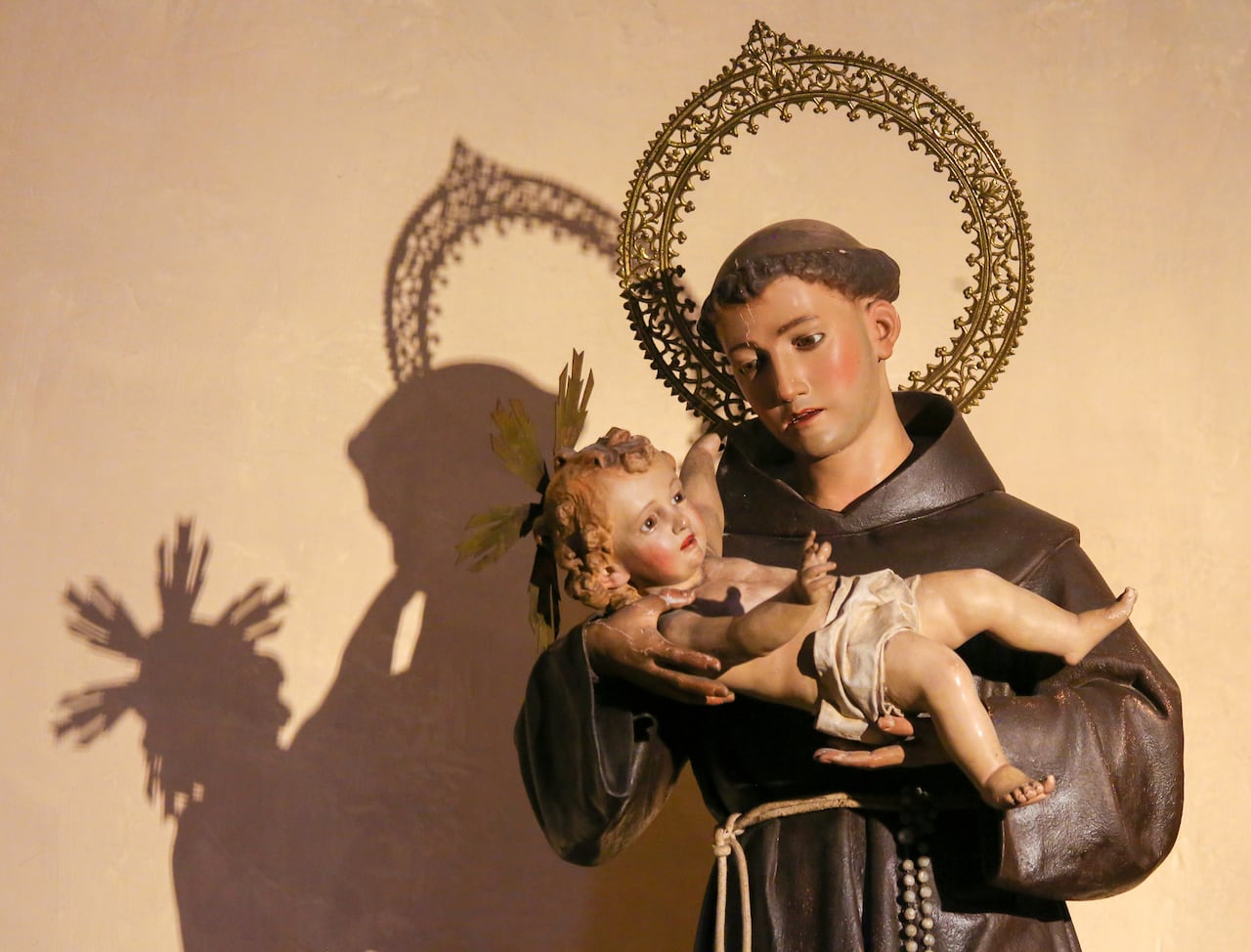 Statue in the Church of Saint Nicholas and Saint Peter Martyr in Valencia, Spain, of Saint Anthony of Padua holding Baby Jesus