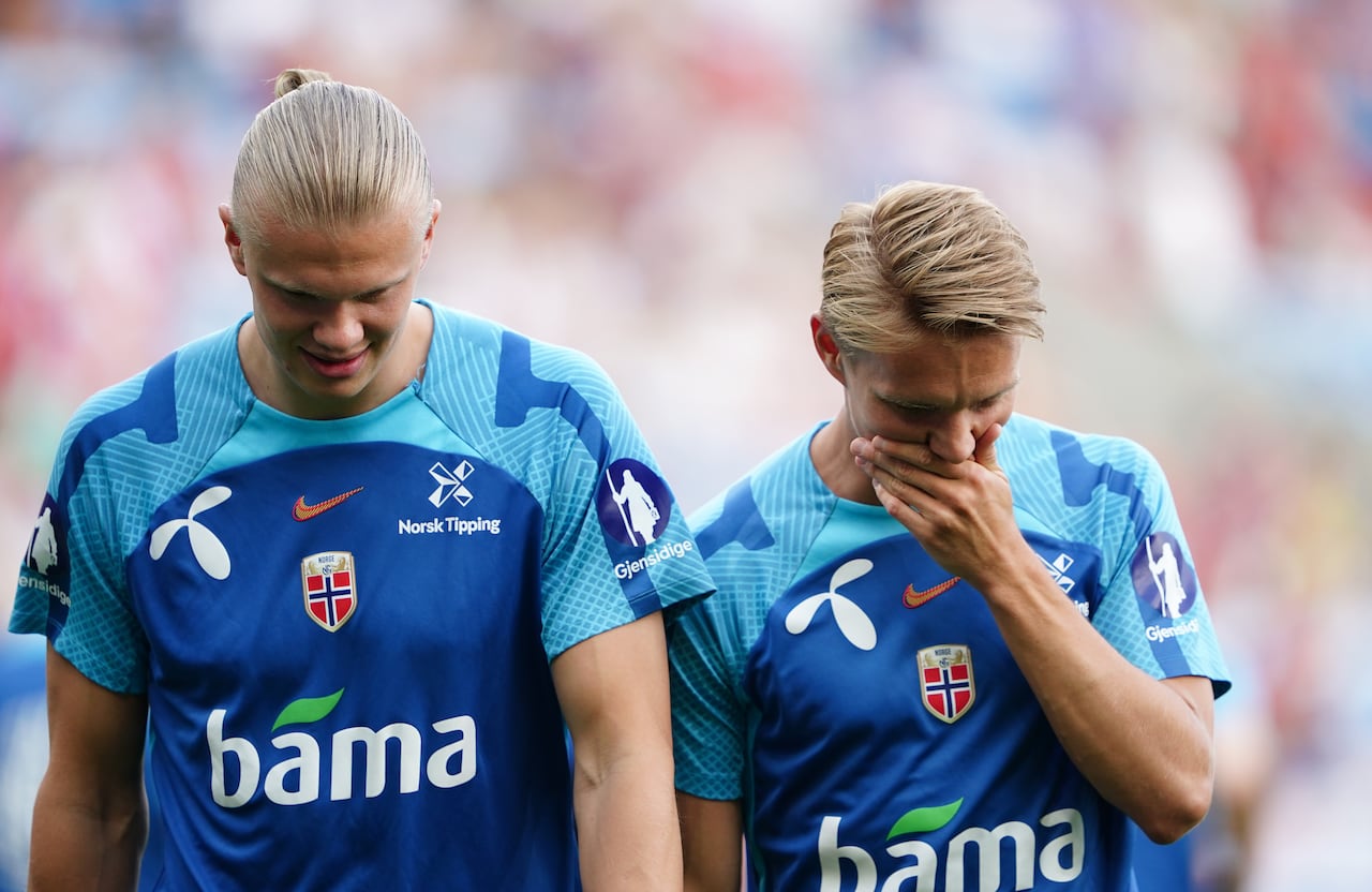 Norway's Erling Haaland (left) and Martin Odegaard warming up before the UEFA Euro 2024 Qualifying Group A match at Ullevaal Stadion, Oslo. Picture date: Saturday June 17, 2023. (Photo by Zac Goodwin/PA Images via Getty Images)