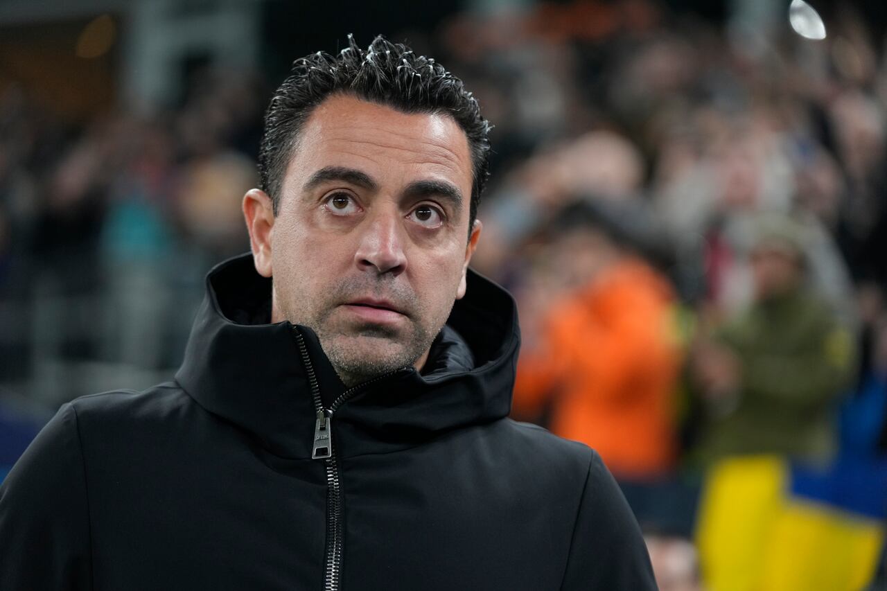 Barcelona's head coach Xavi Hernandez looks on before the Champions League Group H soccer match between Shakhtar Donetsk and Barcelona, at the Volksparkstadion in Hamburg, Germany, Tuesday, Nov. 7, 2023. (AP Photo/Matthias Schrader)