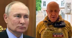 De izquierda a derecha: El presidente Vladimir Putin y Yevgueni Prigozhin, jefe del grupo paramilitar Wagner.