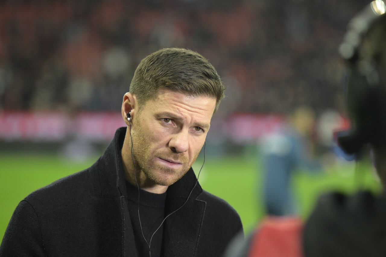Bayer Leverkusen's Spanish head coach Xabi Alonso is interviewed prior to the German first division Bundesliga football match between Bayer 04 Leverkusen and FC Bayern Munich in Leverkusen, western Germany on February 10, 2024. (Photo by Sascha Schuermann / AFP) / DFL REGULATIONS PROHIBIT ANY USE OF PHOTOGRAPHS AS IMAGE SEQUENCES AND/OR QUASI-VIDEO