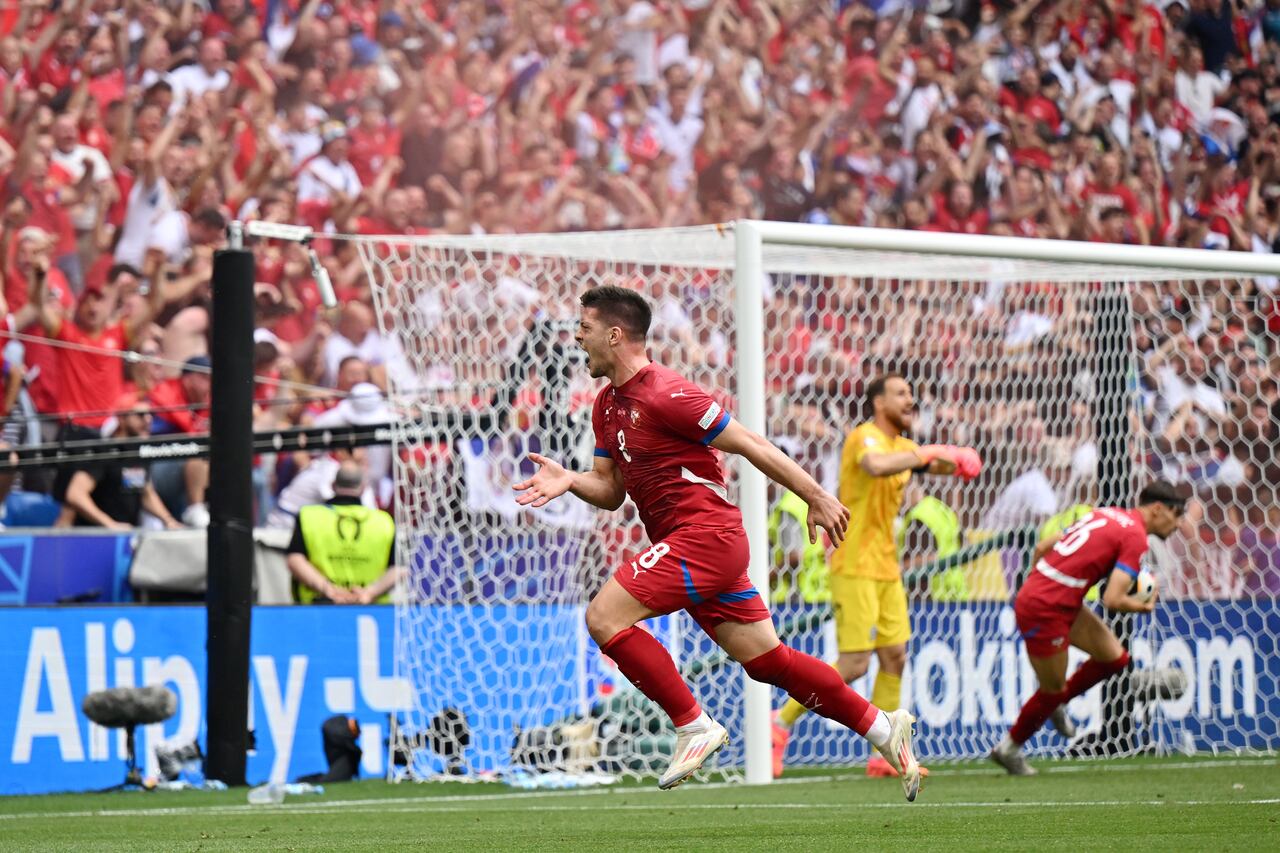 MUNICH, GERMANY - JUNE 20: Luka Jovic of Serbia celebrates scoring his team's first goal during the UEFA EURO 2024 group stage match between Slovenia and Serbia at Munich Football Arena on June 20, 2024 in Munich, Germany. (Photo by Sebastian Widmann - UEFA/UEFA via Getty Images)