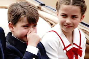 Britain's Prince Louis, left, and Princess Charlotte sit in a carriage as they take part in the Trooping The Colour parade, in London, Saturday, June 17, 2023. Trooping the Colour is the King's Birthday Parade and one of the nation's most impressive and iconic annual events attended by almost every member of the Royal Family. (Aaron Chown/PA via AP)