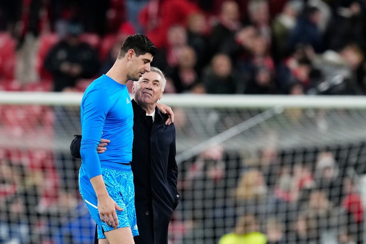 Carlo Ancelotti head coach of Real Madrid and Thibaut Courtois goalkeeper of Real Madrid and Belgium after the LaLiga Santander match between Athletic Club and Real Madrid CF at San Mames Stadium on January 22, 2023 in Bilbao, Spain. (Photo by Jose Breton/Pics Action/NurPhoto via Getty Images)