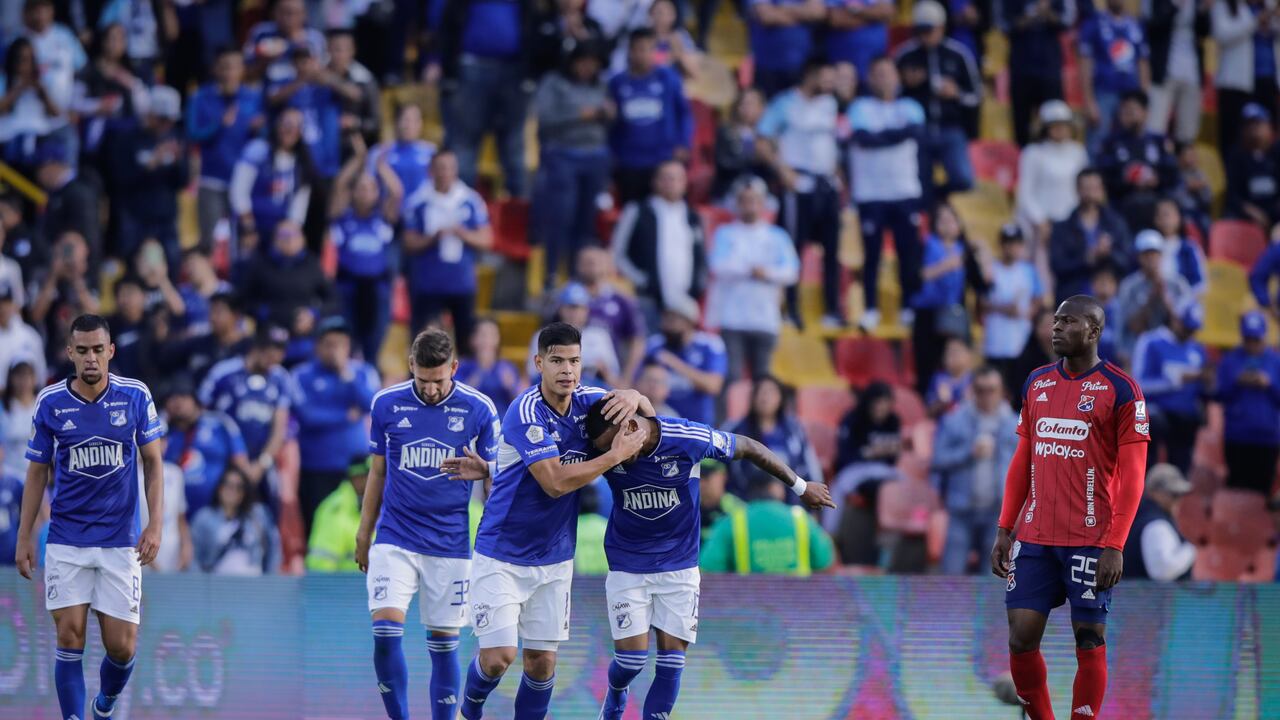 BOGOTA, COLOMBIA - JANUARY 21: Players of Millonarios (L) celebrate the fourth goal during the Liga BetPlay 1st round match between Millonarios and Independiente Medellin at Estadio El Campin on January 21, 2024 in Bogota, Colombia. (Photo by Andres Rot/Getty Images)