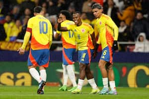 Colombia's midfielder #11 Jhon Arias (2nd R)) celebrates with teammates after scoring his team's second goal during the international friendly football match between Romania and Colombia at the Metropolitano stadium in Madrid on March 26, 2024. (Photo by OSCAR DEL POZO / AFP)
