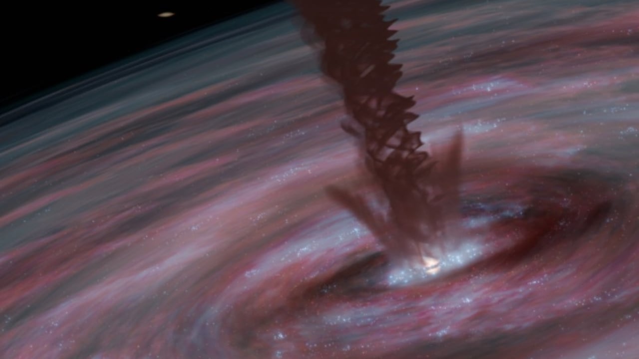 Ilustración de un agujero negro supermasivo en el centro de una galaxia.