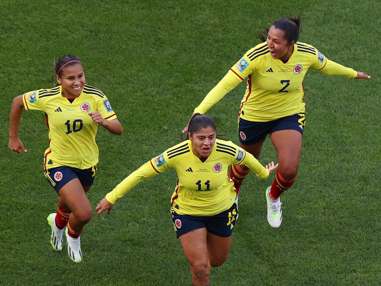 SYDNEY, AUSTRALIA - JULY 25: Catalina Usme (C) of Colombia celebrates with teammates Leicy Santos (L) and Manuela Vanegas (R) after scoring her team's first goal during the FIFA Women's World Cup Australia & New Zealand 2023 Group H match between Colombia and Korea Republic at Sydney Football Stadium on July 25, 2023 in Sydney / Gadigal, Australia. (Photo by James Chance/Getty Images)