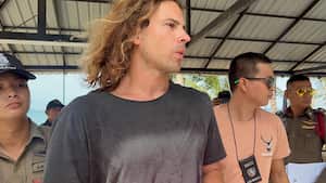 Daniel Sancho Bronchalo, the son of Spanish actor Rodolfo Sancho Aguirre is escorted while assisting Thai police with investigations after he was arrested on charges of murder in the death and dismemberment of his Colombian travelling companion Edwin Arrieta Arteaga on the tourist island of Koh Phangan, Thailand August 7, 2023. REUTERS/Stringer