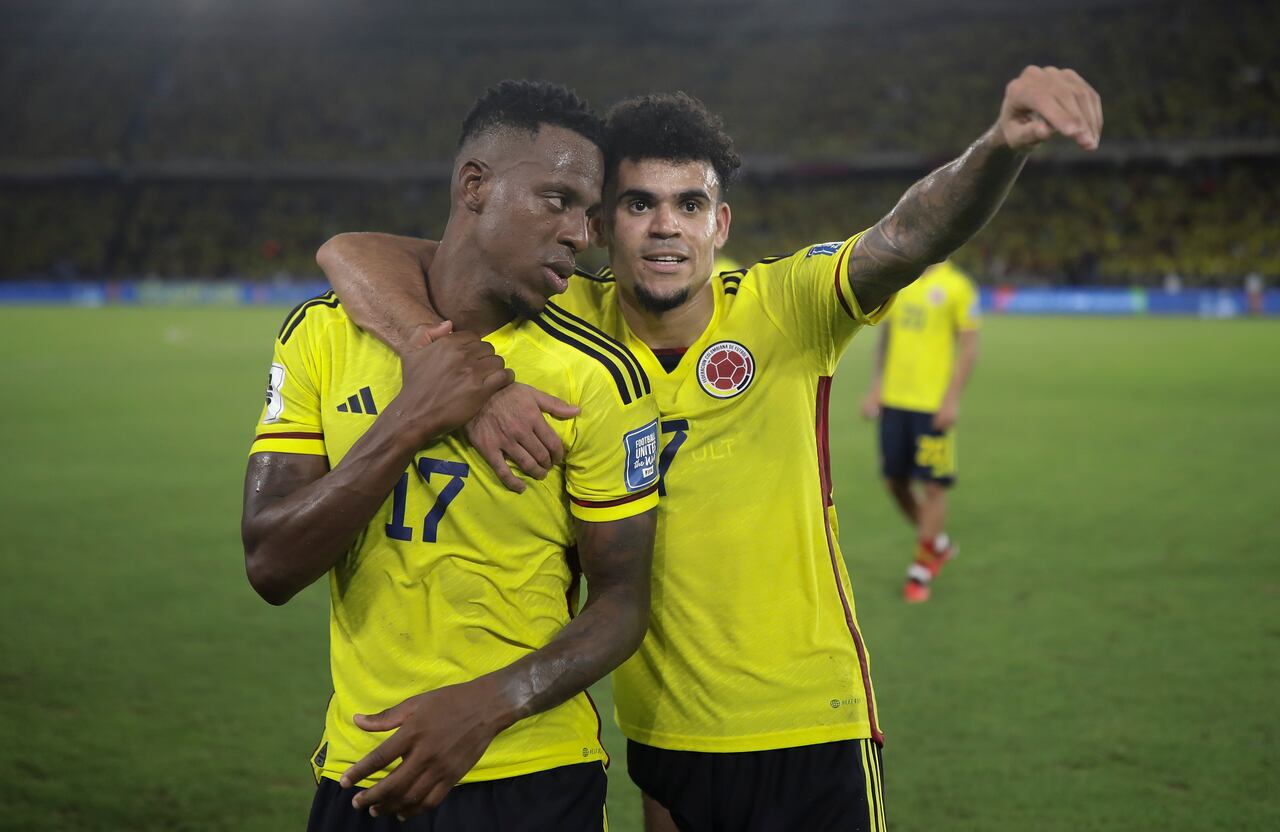 Colombia's Luis Diaz, right, and Colombia's Yaser Asprilla celebrate at the end of a qualifying soccer match against Brazil for the FIFA World Cup 2026 at Roberto Melendez stadium in Barranquilla, Colombia, Thursday, Nov. 16, 2023. Colombia won 2-1. (AP Photo/Ivan Valencia)