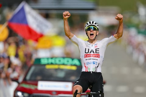UAE Team Emirates team's Slovenian rider Tadej Pogacar cycles to the finish line to win the 4th stage of the 111th edition of the Tour de France cycling race, 140 km between Pinerolo in Italy, and Valloire in France, on July 2, 2024. (Photo by Thomas SAMSON / AFP)