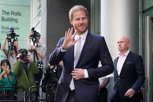 FILE - Prince Harry leaves the High Court after giving evidence in London, Wednesday, June 7, 2023. A London judge has allowed Prince Harry's lawsuit against the publisher of The Sun tabloid to go to trial on claims the newspaper used unlawful methods to gather information about him. (AP Photo/Kin Cheung, File)