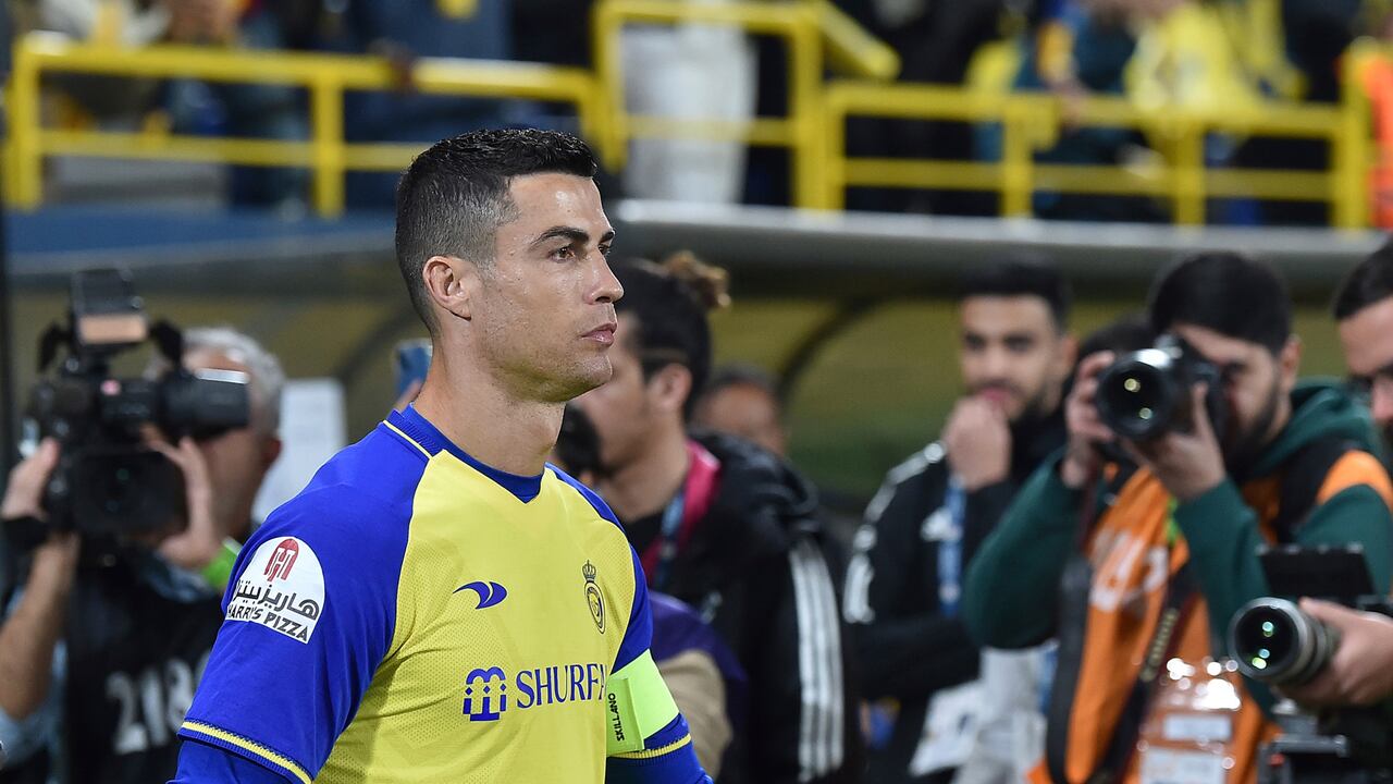 Al Nassr's Cristiano Ronaldo enters the pitch to play the Saudi Pro League match between Al Ettifaq FC and Al Nassr FC at Mrsool Park Stadium, in Riyadh, Saudi Arabia, Sunday, Jan. 22, 2023. (AP Photo)