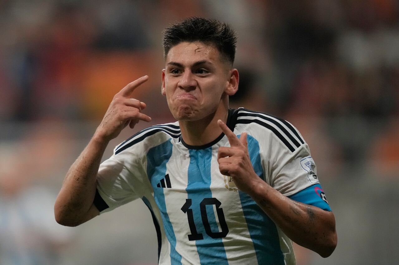 Argentina's Claudio Echeverri celebrates after scoring the second goal for his team during their FIFA U-17 World Cup quarterfinal soccer match against Brazil at Jakarta international Stadium in Jakarta, Indonesia, Friday, Nov. 24, 2023. (AP Photo/Achmad Ibrahim)