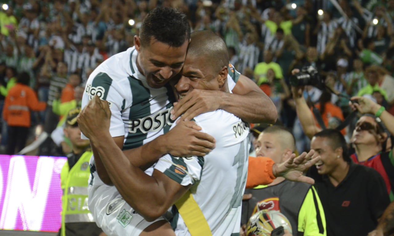 MEDELLIN, COLOMBIA - DECEMBER 20: Macnelly Torres and Alexis Henriquez celebrate after winning a second leg final match between Atletico Nacional and Atletico Junior as part of Liga Aguila II 2015 at Atanasio Girardot Stadium on December 20, 2015 in Medellin, Colombia. (Photo by Getty Images/Marcos Ruiz/LatinContent )