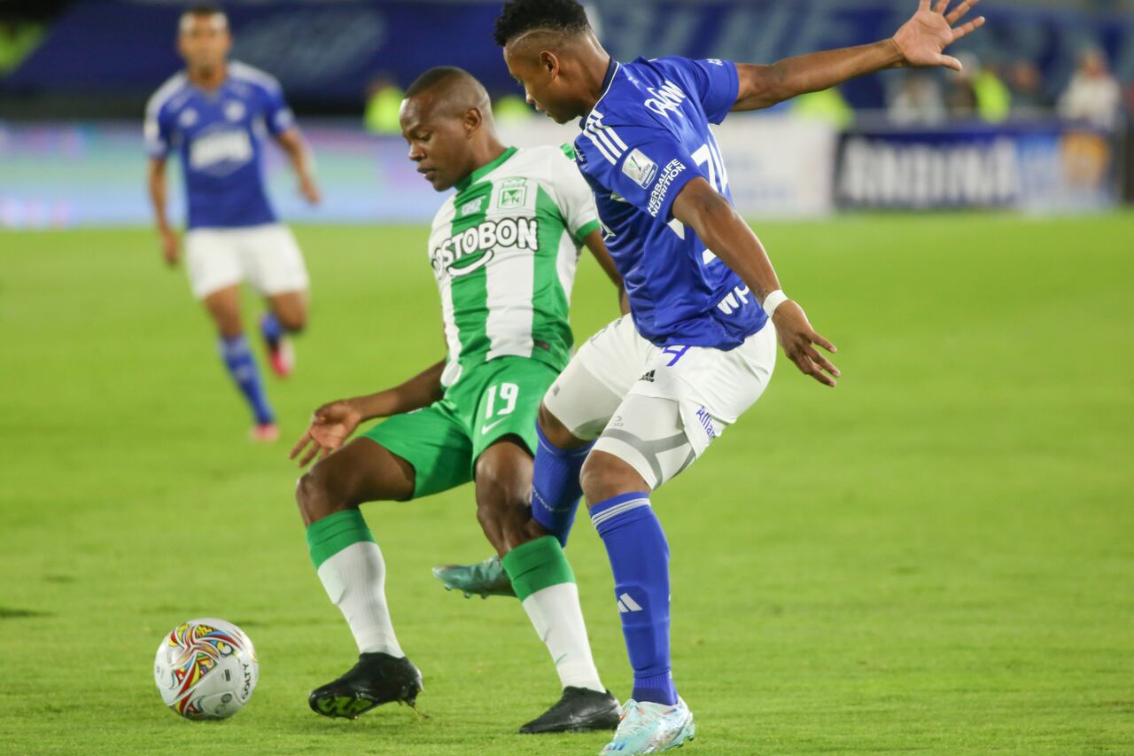 Oscar Cortes of Millonarios F. C. and Yerson Candelo of Atletico Nacional fight for the ball during the second leg of the final of the Liga BetPlay DIMAYOR I 2023 played at the Nemesio Camacho El Campin stadium in Bogota. (Photo by Daniel Garzon Herazo/NurPhoto via Getty Images)
