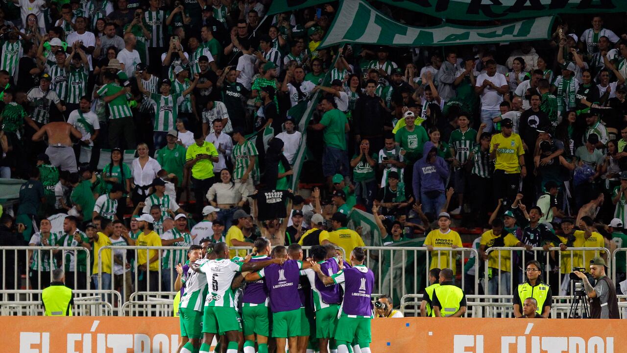 Atletico Nacional's players celebrate a goal during the Copa Libertadores group stage first leg football match between Atletico Nacional and Olimpia, at the Atanasio Girardot stadium in Medellin, Colombia, on May 2, 2023. (Photo by Fredy BUILES / AFP)
