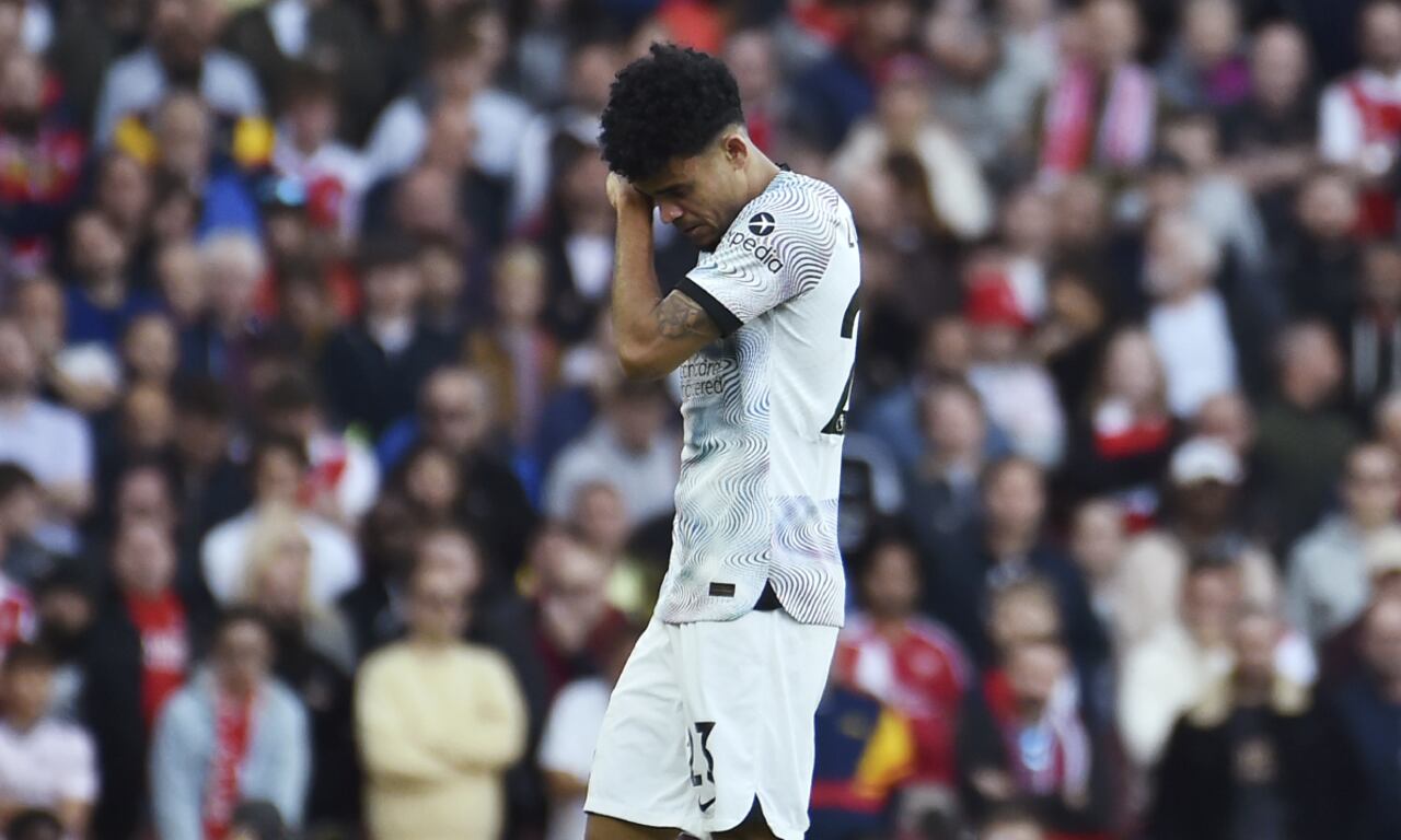 Liverpool's Luis Diaz leaves the field after injuring during the English Premier League soccer match between Arsenal and Liverpool at Emirates Stadium in London , Sunday, Oct. 9, 2022. (AP/Rui Vieira)